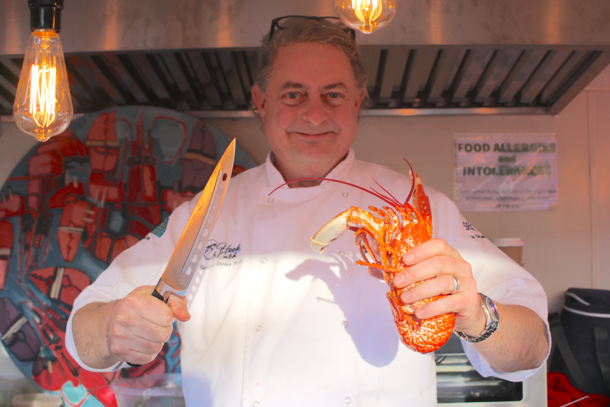 Chef Rob Green with a lobster